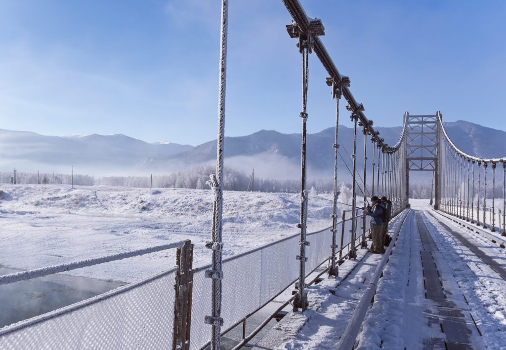 SNOW FISHING AT THE TAKOTNA BRIDGE